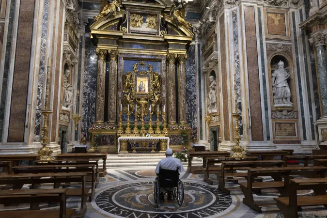 Pope Francis prays before the Salus Populi Romani icon at the Basilica of St. Mary Major in Rome, Dec. 8, 2024.