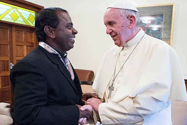 Fr. Lazar Arasu, the Director of Don Bosco Palabek Refugee Services with Pope Francis in Rome.