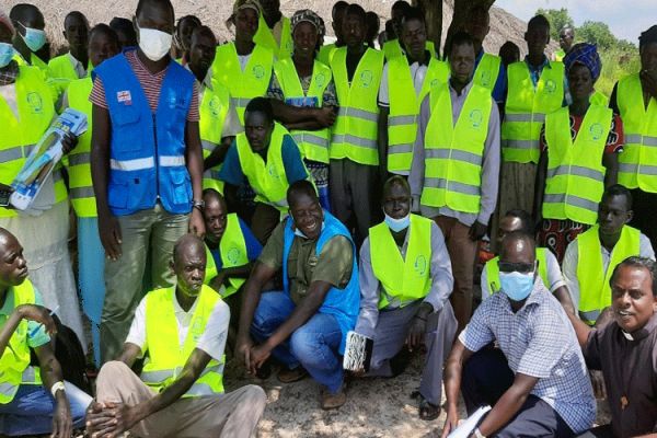 Fr. Lazar Arasu with participants at Peace Meeting with UNHCR and other Leaders in South Sudan / Don Bosco Palabek Refugee Services