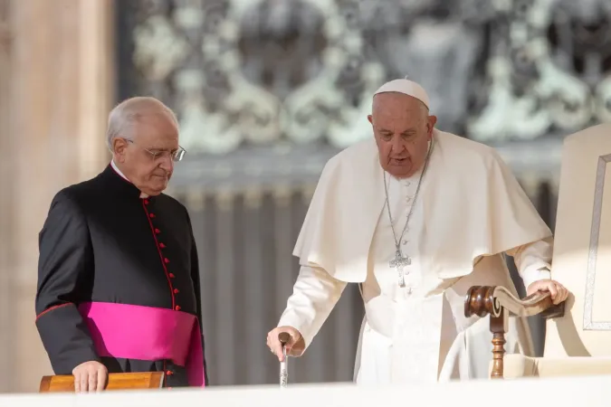 Pope Francis walks to his chair for the general audience in St. Peter’s Square, Sept. 25, 2024. The pope spoke softly and had to pause occasionally to cough after canceling two meetings earlier in the week due to what the Vatican said was a “mild flu-like condition.”