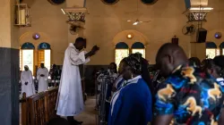 Worshippers attend a Mass at Ouagadougou's Catholic cathedral on June 12, 2022, in Burkina Faso. The country has been grappling with Islamist terrorism since 2015 and Christian communities live in fear of furhter attacks. / Credit: OLYMPIA DE MAISMONT/AFP via Getty Images