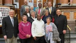 Fr. Raphael Assamah with some Iowa legislators. Credit: Accra Archdiocese