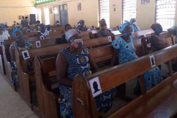 Parishioners of St. Anthony of Padua Parish at 3-Town Denu in the Keta-Akatsi Diocese seated at Mass on June 7 after three months of restrictions. / Cephas Afornu