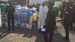 Archbishop John Bonaventure Kwofie with Patrick Darko Missah during donation exercise at the Ghana prisons headquarters, Tuesday, April 7 2020.