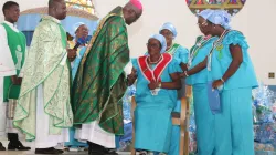 Archbishop John Bonaventure Kwofie, Apostolic Administrator of the Sekondi-Takoradi Diocese congratulating Dame Theresa Arkhurst after her installation as the 8th National President of the St. Theresa of the Child Jesus Society at the Star of the Sea Cathedral at Takoradi on November 17, 2019. / Damian Avevor