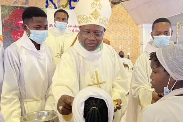 Archbishop Ignatius Kaigama during the conferring of the Sacrament of Confirmation at Holy Ghost Saburi Parish in Abuja/ Credit: Archbishop Ignatius A. Kaigama/ Facebook