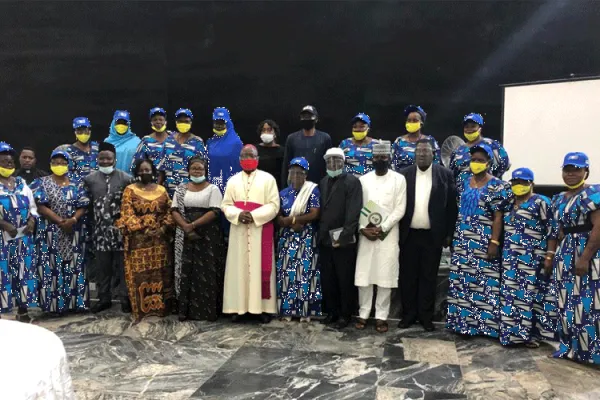 Archbishop Ignatius Kaigama with Tiv and Jukun women at a women Peace-Building Conference that took place at the Global Suite Hotel in Nigeria’s Nasarwa State. / Archbishop Ignatius Kaigama