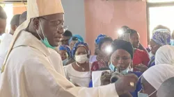 Archbishop Ignatius Kaigama administering the Sacrament of Confirmation at St. Patrick’s Karshi Parish of Abuja Archdiocese. Credit: Archdiocese of Abuja/Facebook