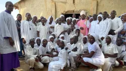 Archbishop Ignatius Ayau Kaigama with catecumens at St. Paul’s Pastoral Area in Sauka Wasa, Abuja. Credit: Abuja Archdiocese