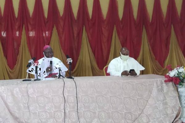 Archbishop Ignatius Kaigama (left) during Thursday's press conference in Abuja, Nigeria. / Archbishop Ignatius Kaigama