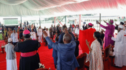 Religious Leaders, dignitaries, and other invited guests raise their hands in a gesture of worship during the National Prayer Day held at State House Nairobi on March 21, 2020. / State House, Nairobi Kenya.