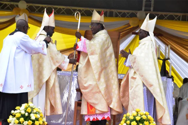 Outgoing Kericho Bishop, Emmanuel Okombo hands over the crosier to Bishop Alfred Rotich. The crosier is a sign of a bishop's authority and jurisdiction. / ACI Africa