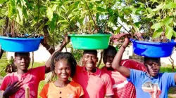 Youth at Don Bosco Refugee Services, Palabek in Uganda's Catholic Archdiocese of Gulu during a tree planting session at the refugee center on 16 August  2021. Credit: Fr. Lazar Arasu