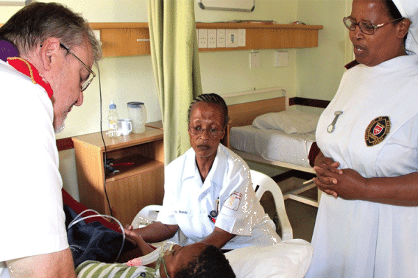 Fr. Gérard Lagleder and some of his staff in an Order of Malta clinic in Mandeni, South Africa. / Vatican News