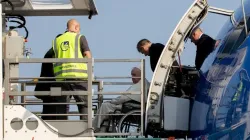 Pope Francis prepares to board an ITA Airlines plane for his approximately 10-hour flight from Rome to Edmonton in western Canada on July 24, 2022. Daniel Ibañez/CNA