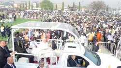 Caption: Pope Francis greeting congregation at Dr. John Garang Mausoleum on 5 February 2023 just before presiding over Holy Mass
Credit: ACI Africa