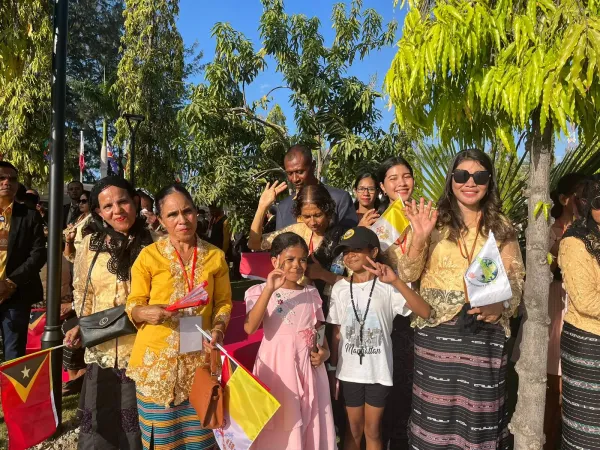 Crowds line the streets of Dili, East Timor, for miles to greet Pope Francis upon his arrival to the country on Sept. 9, 2024.