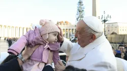 Pope Francis blesses a toddler during his general audience on Wednesday, Dec. 4, 2024, in St. Peter’s Square. / Credit: Vatican Media