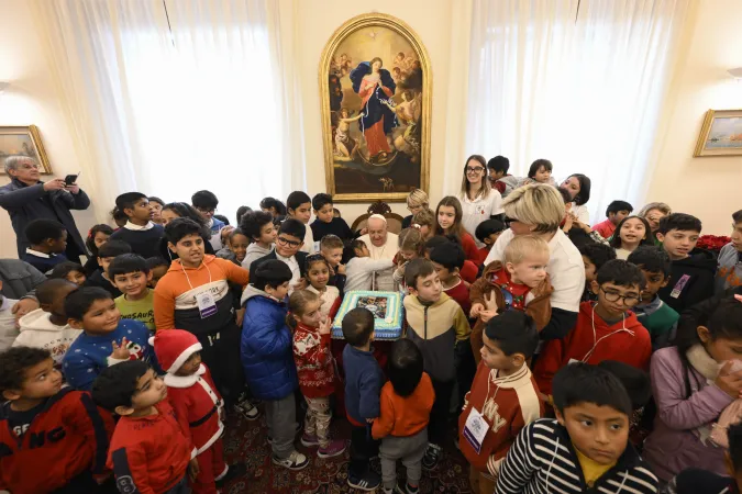 Pope Francis visits a group of children and mothers from the Santa Marta Dispensary to offer them his personal Christmas greetings on Dec. 22, 2024.