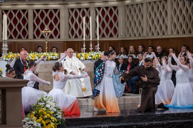 Pope Francis watches a performance of an original theatrical dance reenacting important moments from the life of St. Francis of Assisi at the Luxembourg cathedral on Sept. 26, 2024.