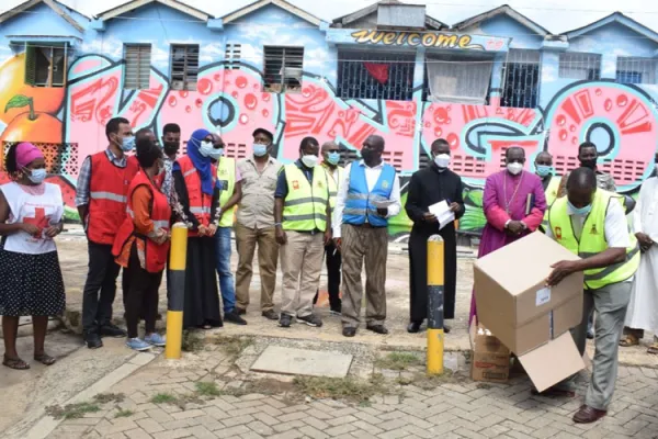 Religious leaders are joined by Red Cross officials for Covid-19 Sensitization exercise and distribution of masks and sanitizers at Kongowea Market in Mombasa. Credit: Archdiocese of Mombasa
