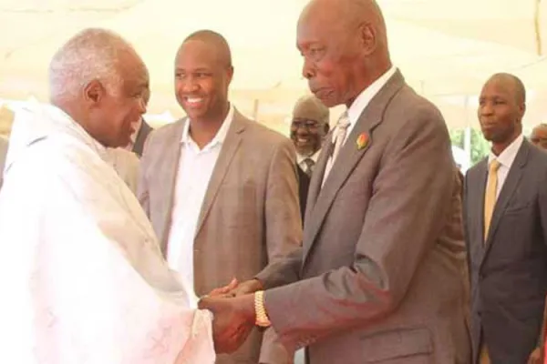Kenya's late former President Daniel Moi (right) greeting the former Catholic Bishop of Eldoret Diocese, the late Cornelius Korir (left)