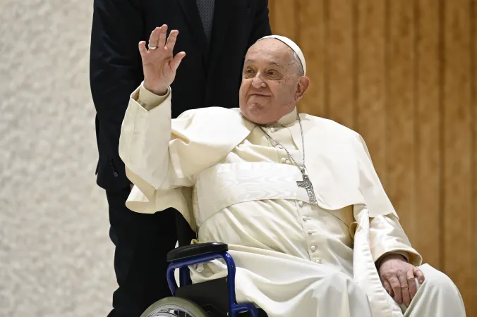 Pope Francis greets pilgrims from his wheelchair during the Saturday jubilee audience in the Vatican’s audience hall, Jan. 11, 2025.