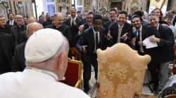 A group of comedians and humorists, including Chris Rock and Jimmy Fallon (center), share a lighthearted exchange with Pope Francis during a gathering with the pope in the Apostolic Palace at the Vatican on June 14, 2024. / Credit: Vatican Media