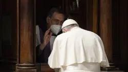 Pope Francis goes to confession during a penance service in St. Peter's Basilica on March 25, 2022. Vatican Media.