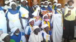 Bishop-elect Christian Carlassare standing amidst South Sudanese Catholic women. / Courtesy Photo