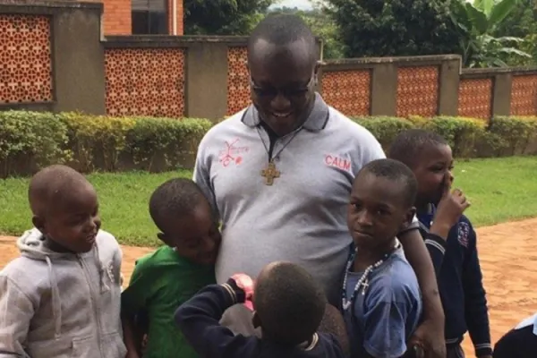 Salesian Bro. Hubert Twagirayezu with some of the street children being supported by Salesians in Rwanda. Credit: Agenzia Info Salesiana (ANS)