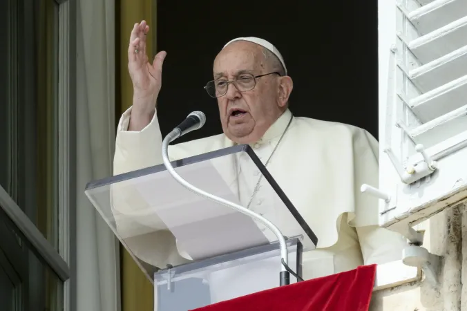 Pope Francis gives his blessing at the end of his weekly Sunday Angelus on Sept. 22, 2024. The pope delivered his reflection on the day's Gospel from a window overlooking St. Peter's Square before leading the traditional Marian prayer.