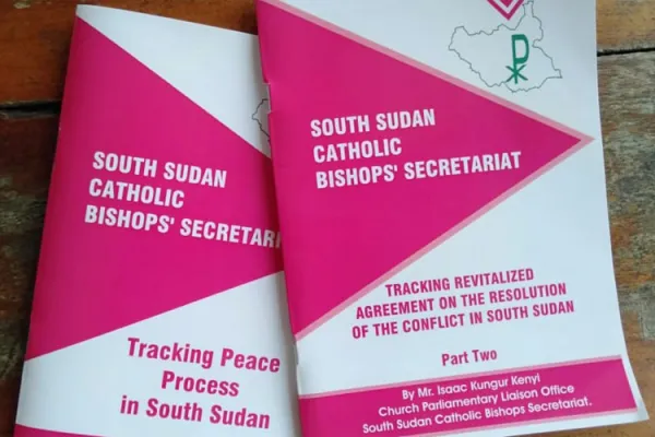 Booklets being distributed in South Sudan, one titled, Tracking Peace Process in South Sudan," the other, "Tracking Revitalized Agreement on the Resolution of the Conflict in South Sudan" / ACI Africa
