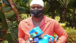 Janet Nyamutenha (37) from Zimbabwe is pictured with the free dignity kit she received through a women’s empowerment initiative. Before this, she couldn’t afford feminine hygiene products. Credit: Trócaire