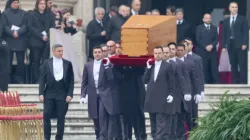 The coffin of Pope Emeritus Benedict XVI is carried into St. Peter's Square prior to his funeral Mass on Jan. 5, 2023. | Daniel Ibañez/CNA