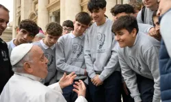 Pope Francis speaks with young men during a general audience. / Credit: Vatican Media